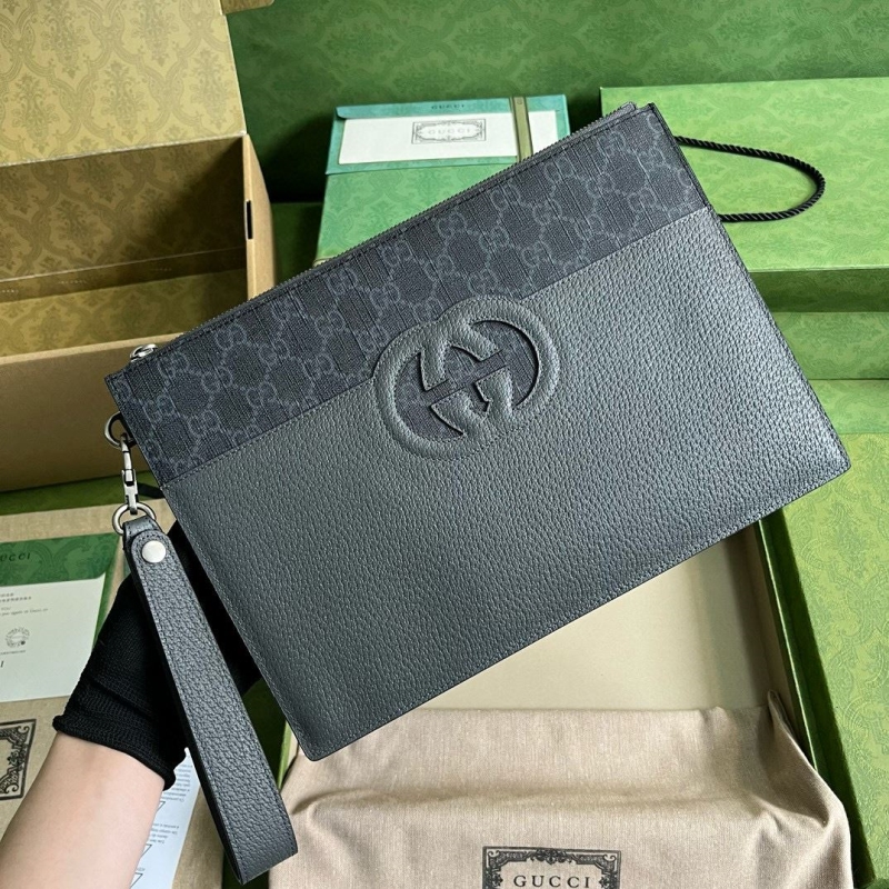 G*u*i clutch bags